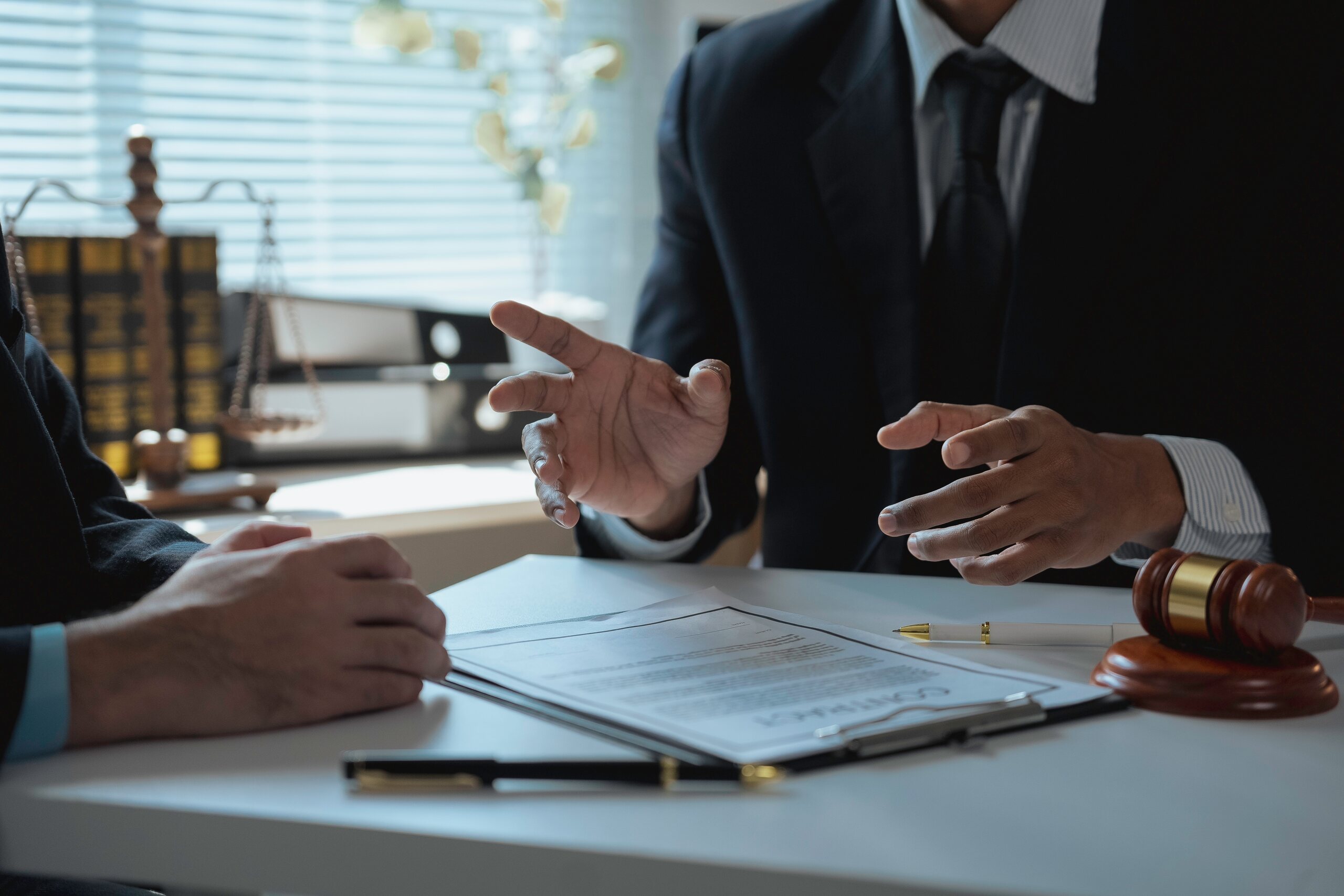 Attorney explaining legal options while calculating pain and suffering in Washington and understanding non-economic damages.