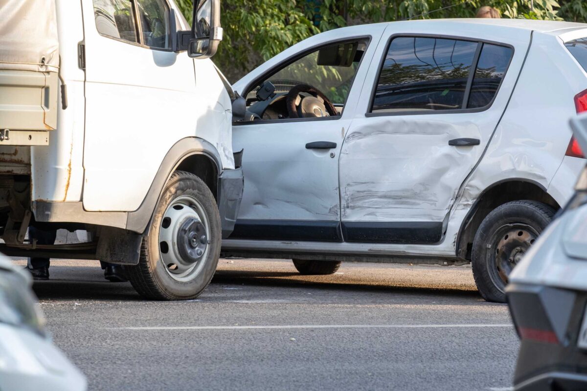 Truck and car collision illustrating who is liable in a truck accident in Washington.