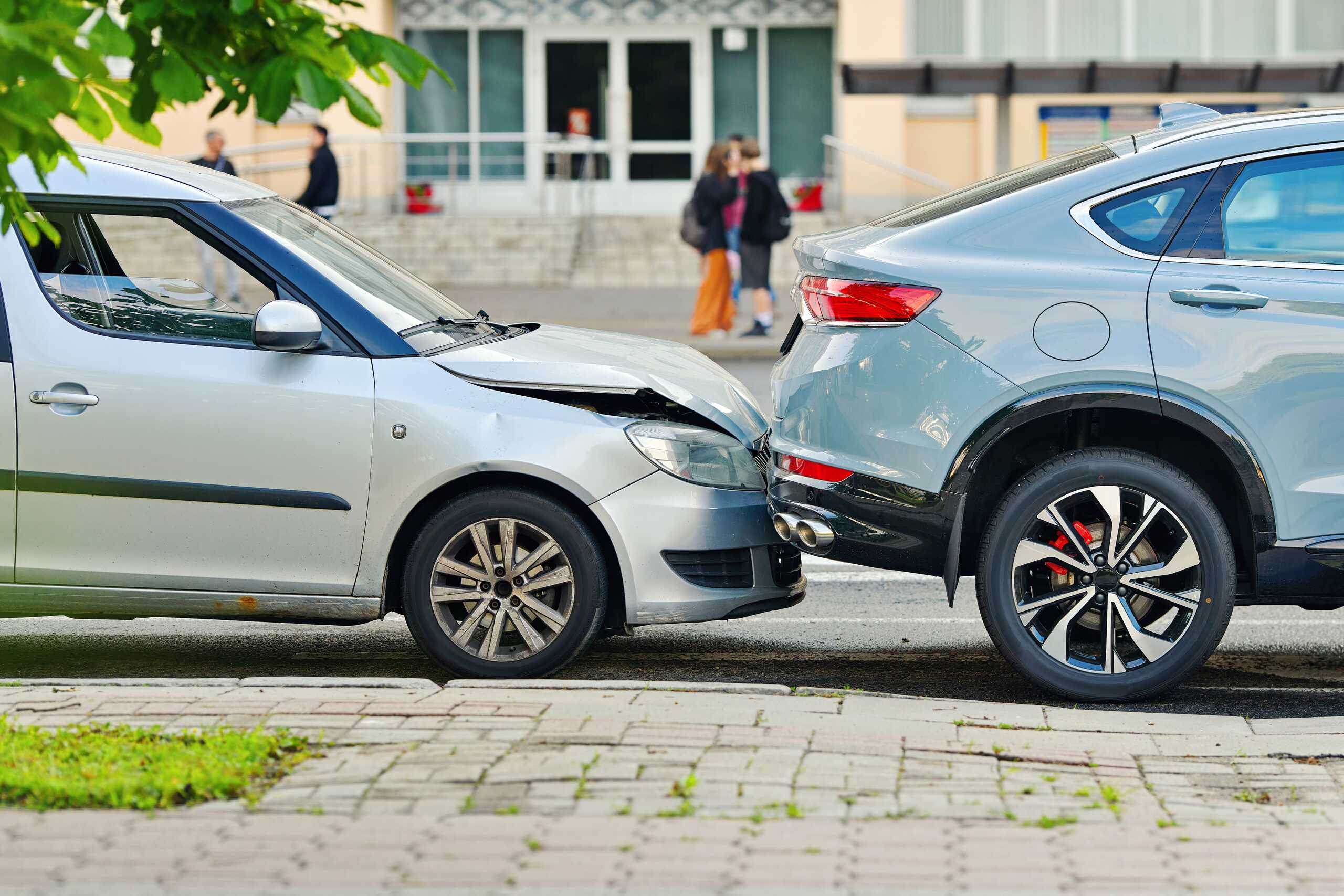 Rear-end accident in Washington showing car impact and damag