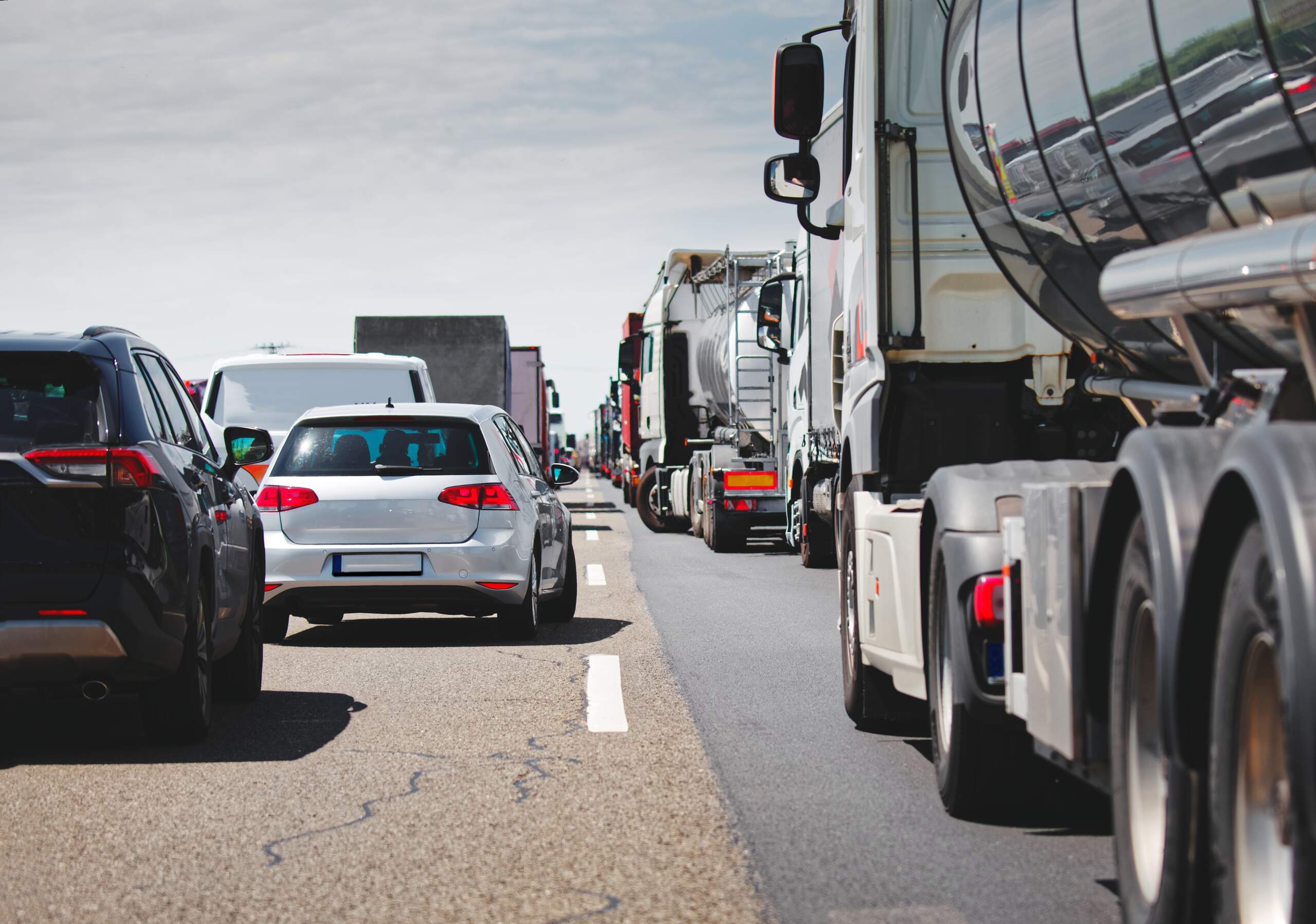 Heavy truck traffic in Washington, highlighting the complexity of truck accidents and why hire a truck accident lawyer.