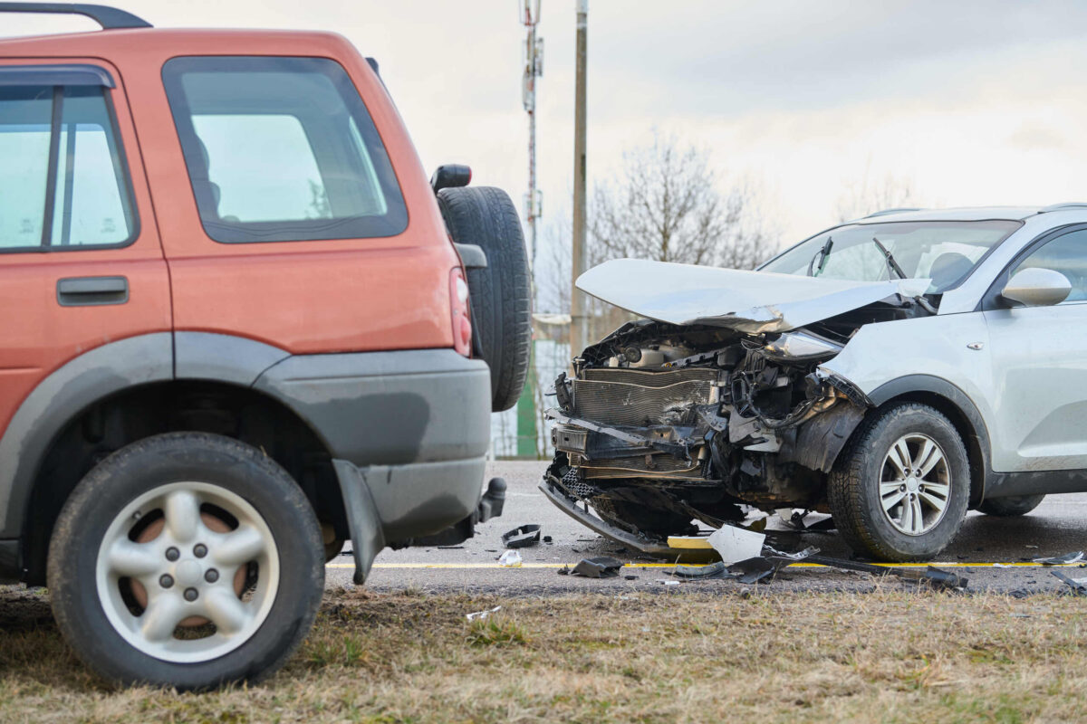 Two vehicles with significant front-end damage after a collision, illustrating the urgent need to document a Spokane car accident scene before physical evidence disappears.